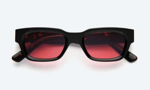 Runner wearing wraparound sunglasses outdoors, best wraparound sunglasses for running