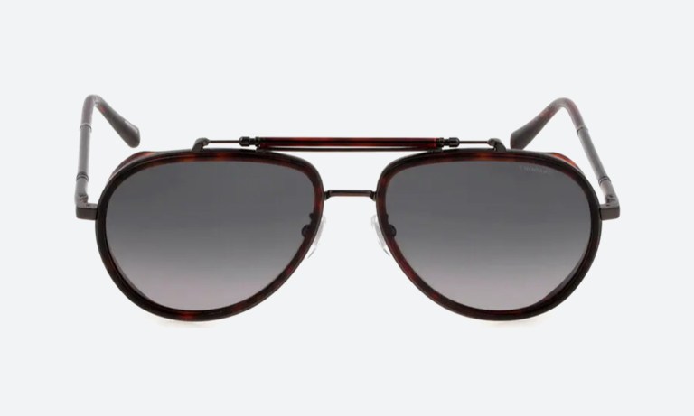 Lifestyle shot of aviators being tried on, aviator sunglasses
