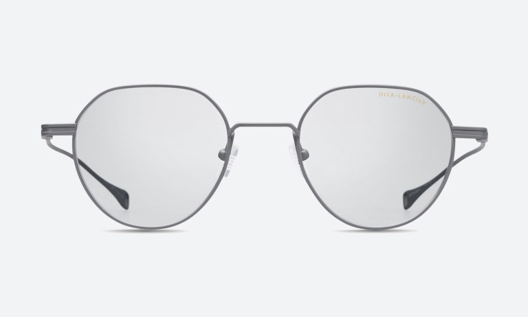 Prescription eyewear frames displayed on a lens chart background