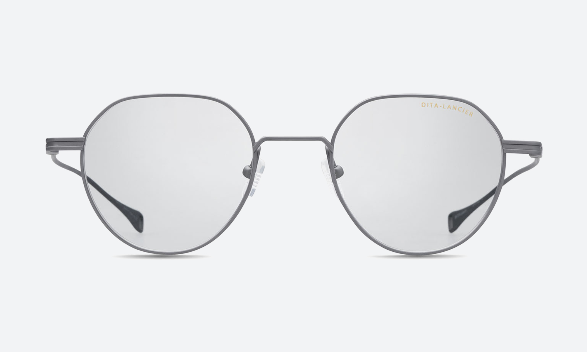 Prescription eyewear frames displayed on a lens chart background