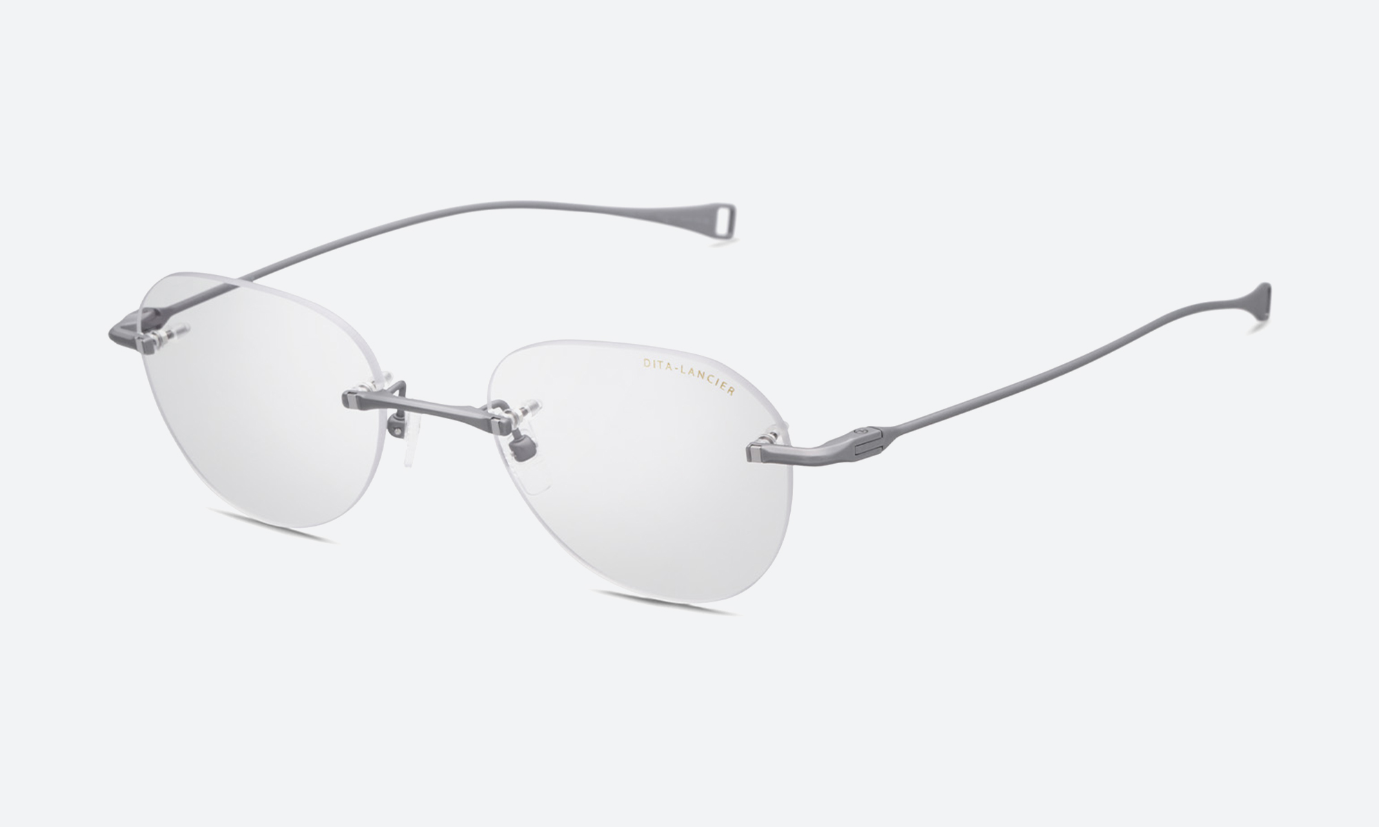 Lifestyle shot of rimless eyewear being tried on, how to choose rimless glasses