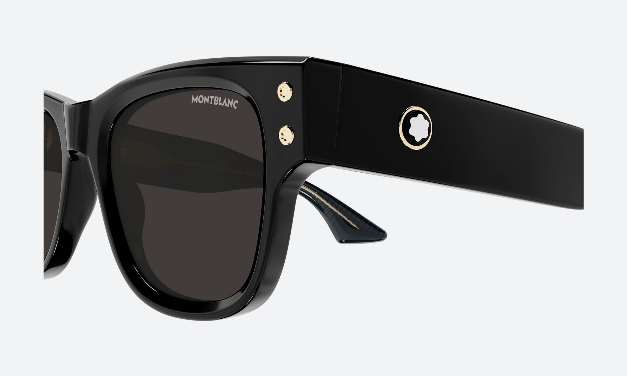 Collection of sunglasses for men arranged flat on a neutral background Additional image alts: Six shapes of sunglasses for men compared side by side | Titanium sunglasses for men showing hinge and nose pad detail