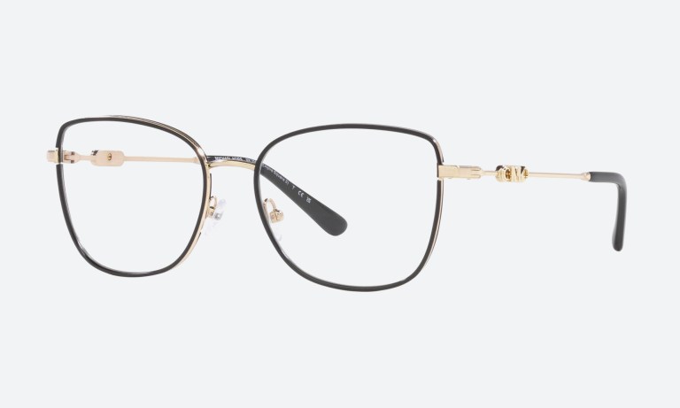 Woman wearing rose gold aviator sunglasses for women with gradient brown lenses