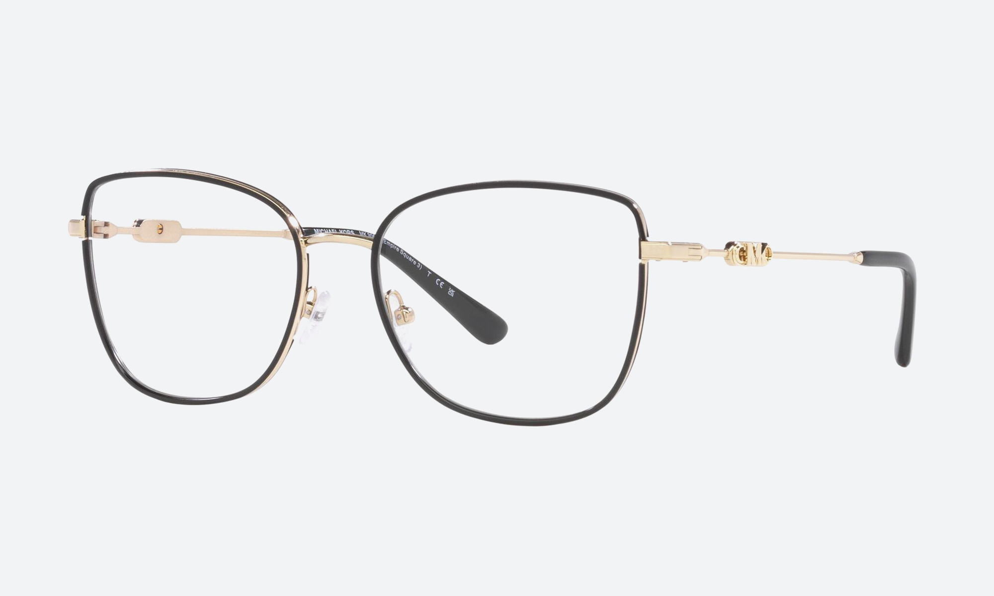 Woman wearing rose gold aviator sunglasses for women with gradient brown lenses