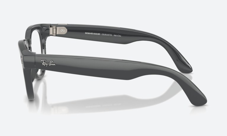 Hero flat-lay of wayfarer sunglasses on neutral background