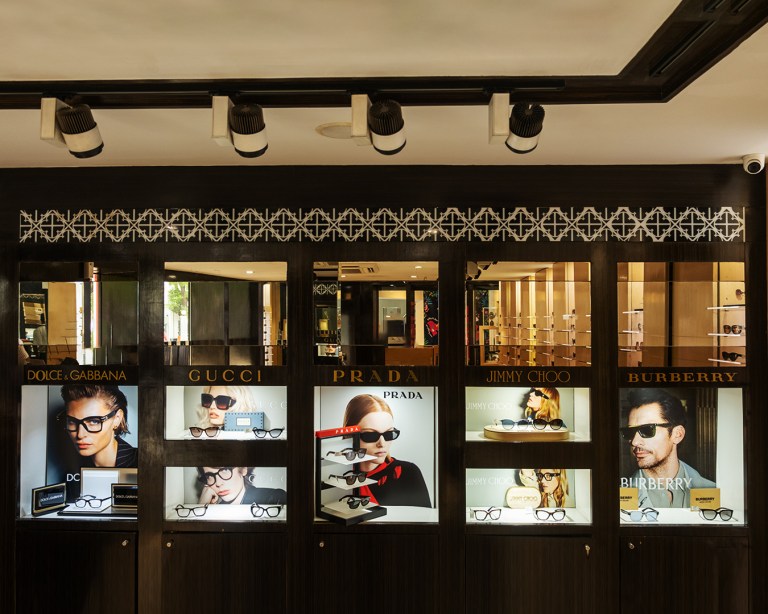 Gucci sunglasses with the gold GG logo on the temple, luxury designer frames