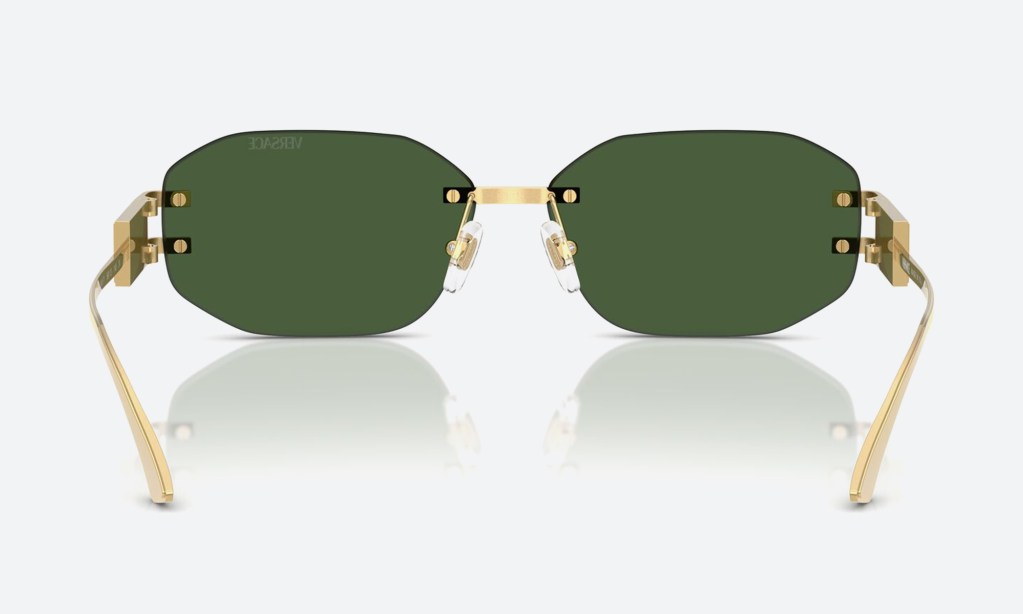 Flat-lay of Versace glasses frames with the Medusa detail
