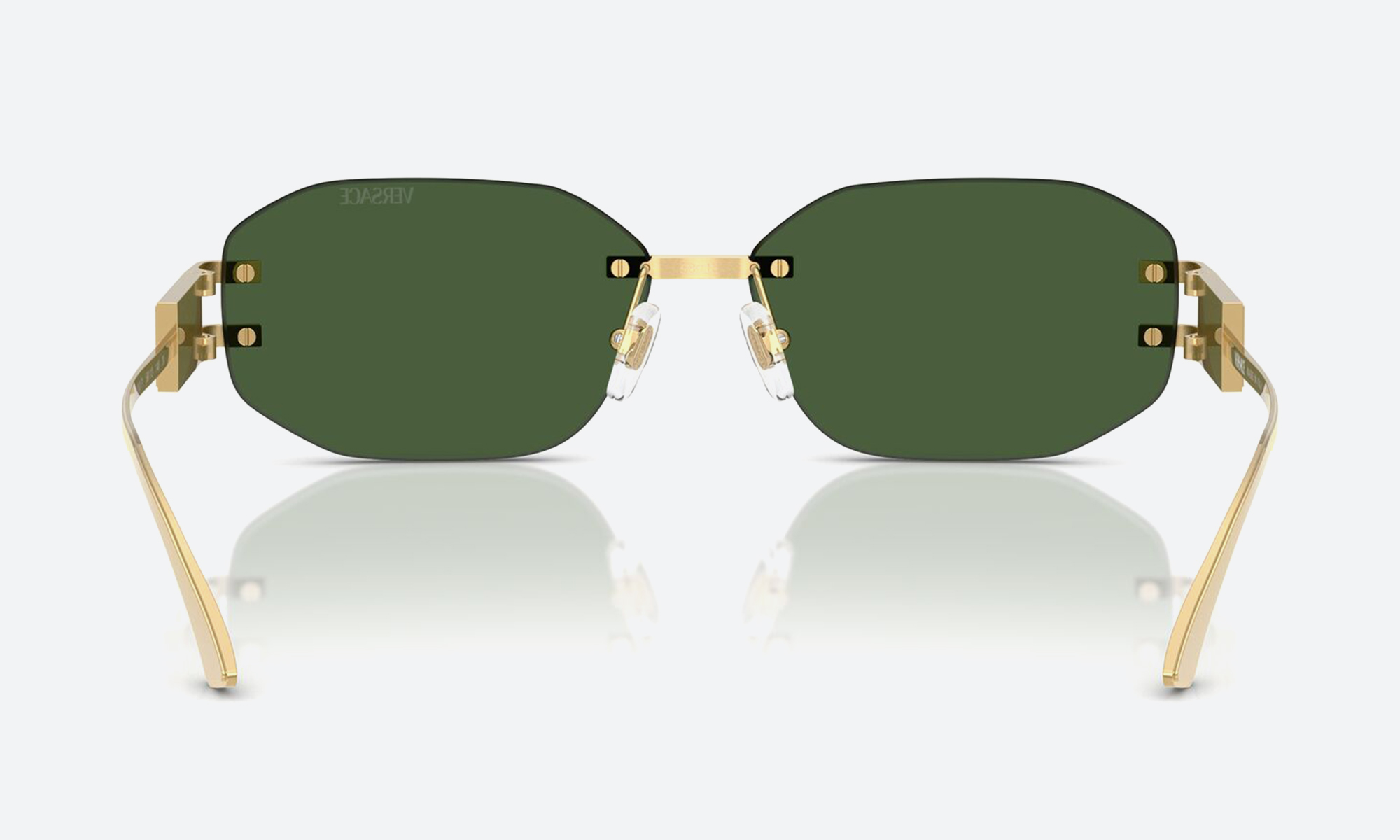 Flat-lay of Versace glasses frames with the Medusa detail