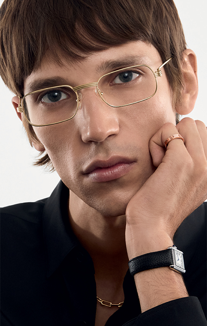 Cartier glasses with gold finish and Santos screw motif, luxury French eyewear