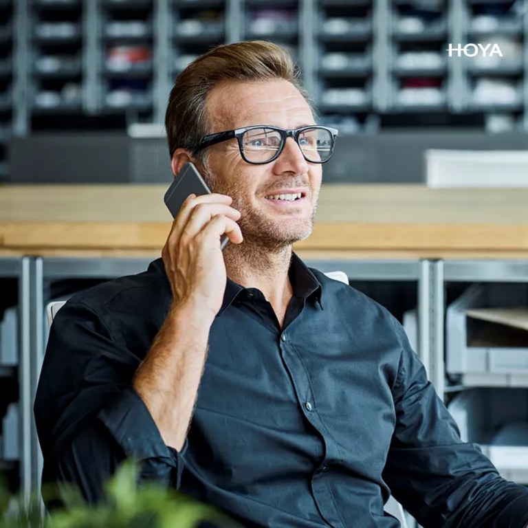 Side-by-side of bifocal and progressive lenses, bifocal lens