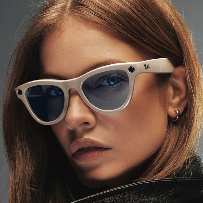 Woman wearing Ray-Ban sunglasses for women, cat-eye style with gradient lenses